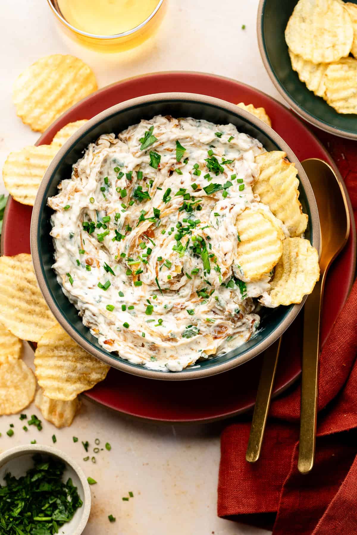 French onion dip in a bowl with potato chips