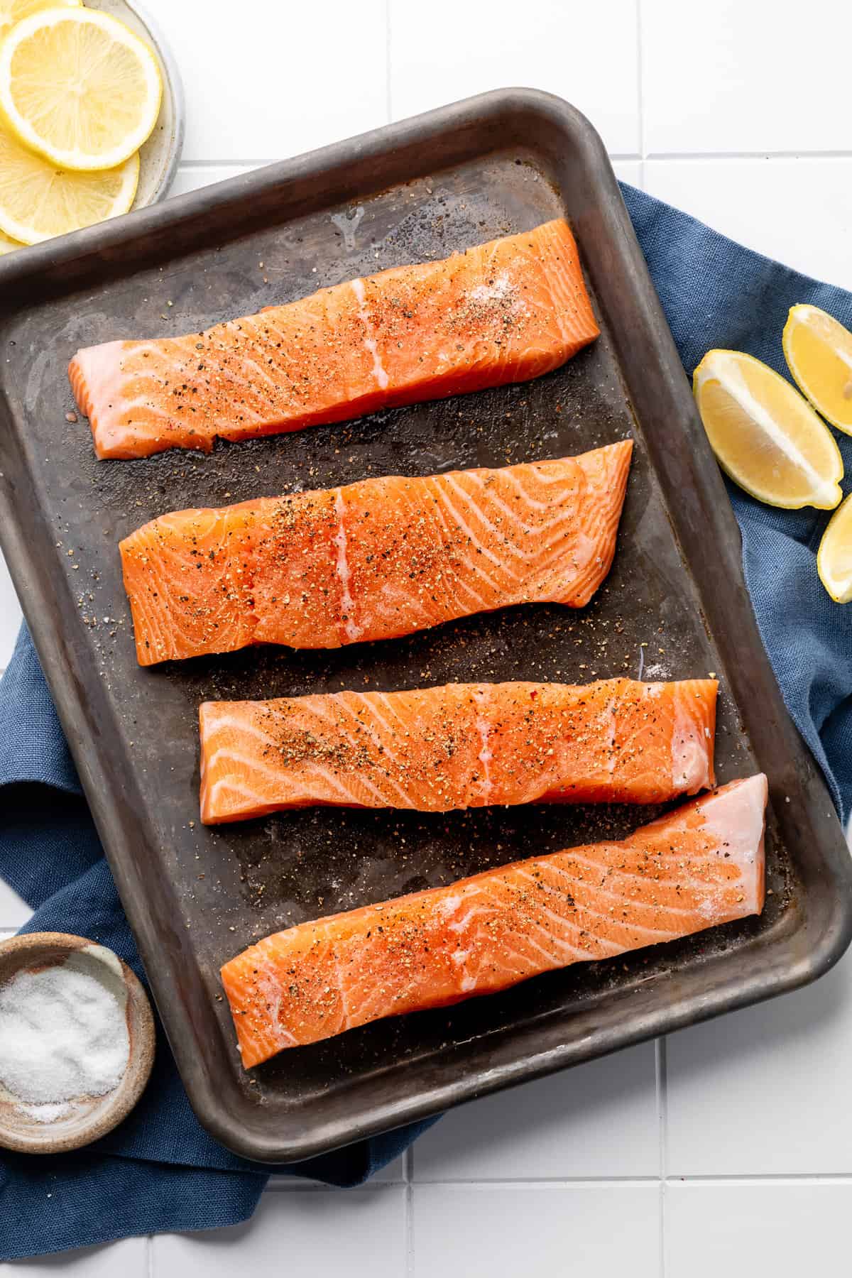 raw salmon on sheet. pan