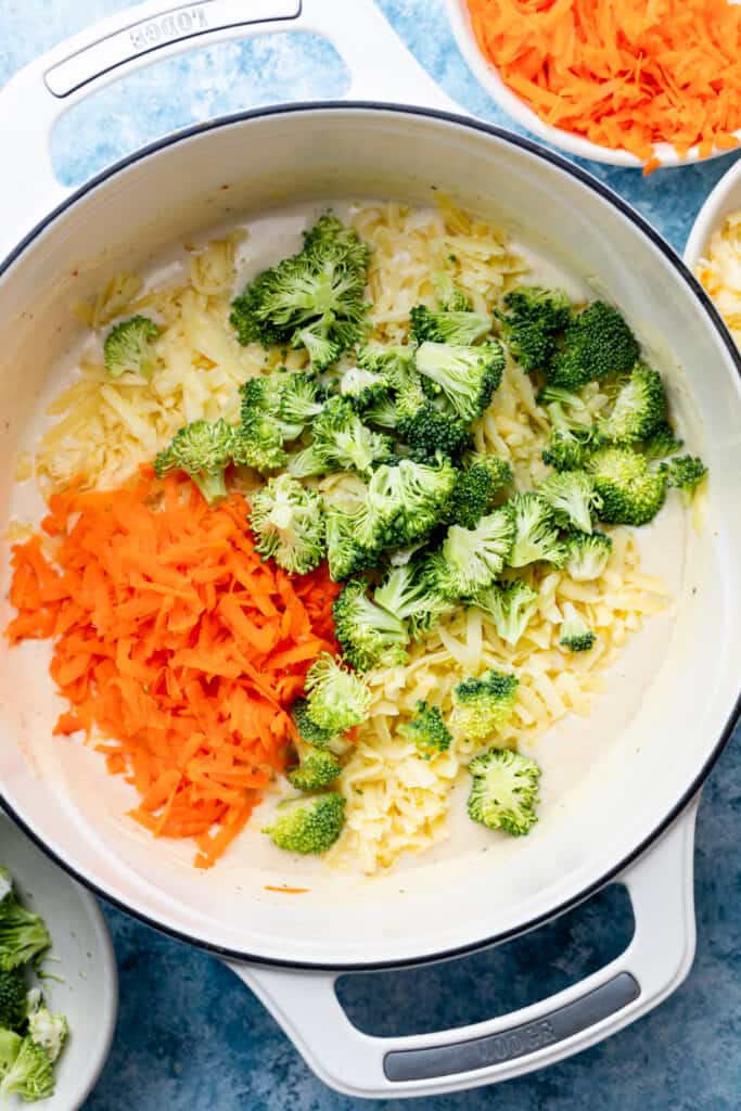 broccoli, carrot, and noodles in pot