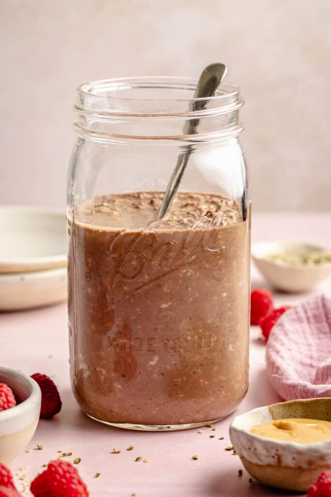 overnight oats in mason jar with spoon