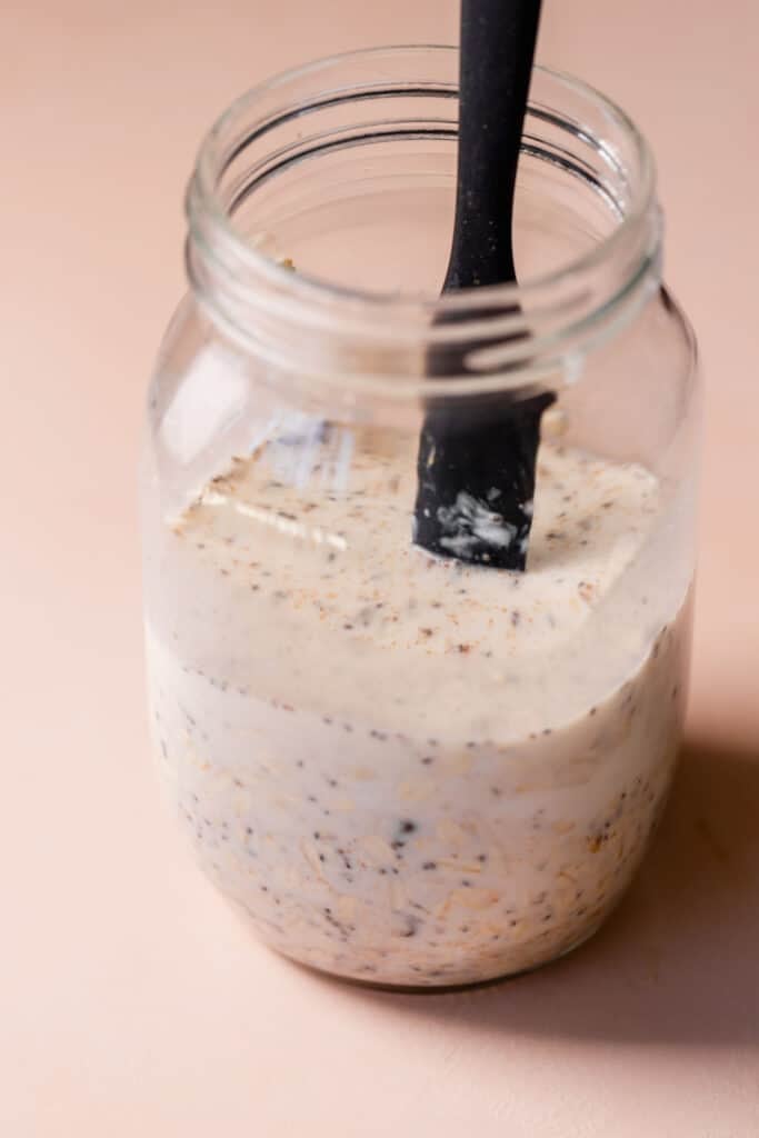 overnight oats in mason jar with spoon