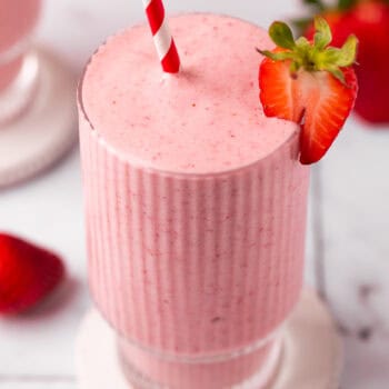 smoothie in clear glass with strawberry