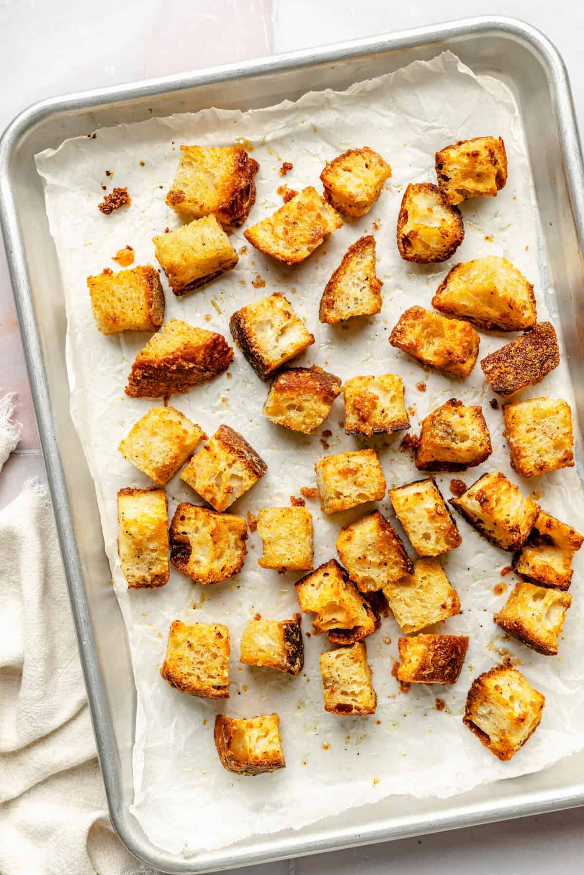 croutons on lined sheet pan