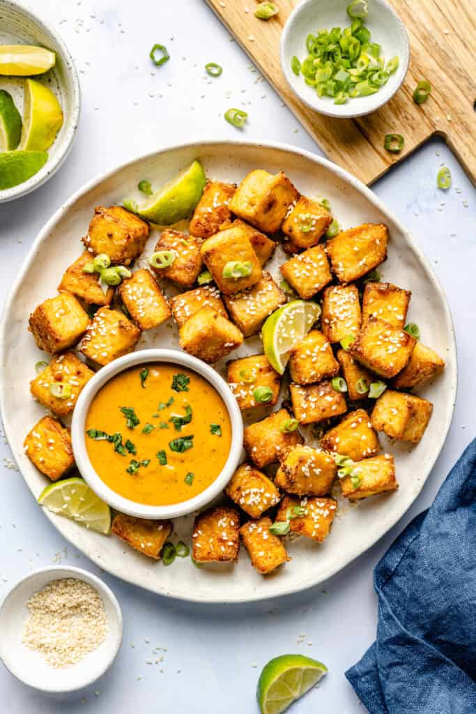 crispy tofu on plate with dipping sauce