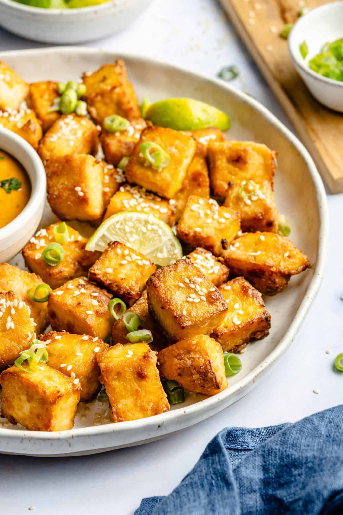 crispy tofu on sauce with dipping sauce