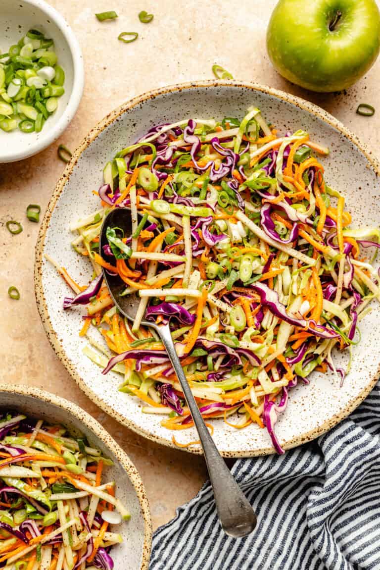 slaw in bowl with spoon