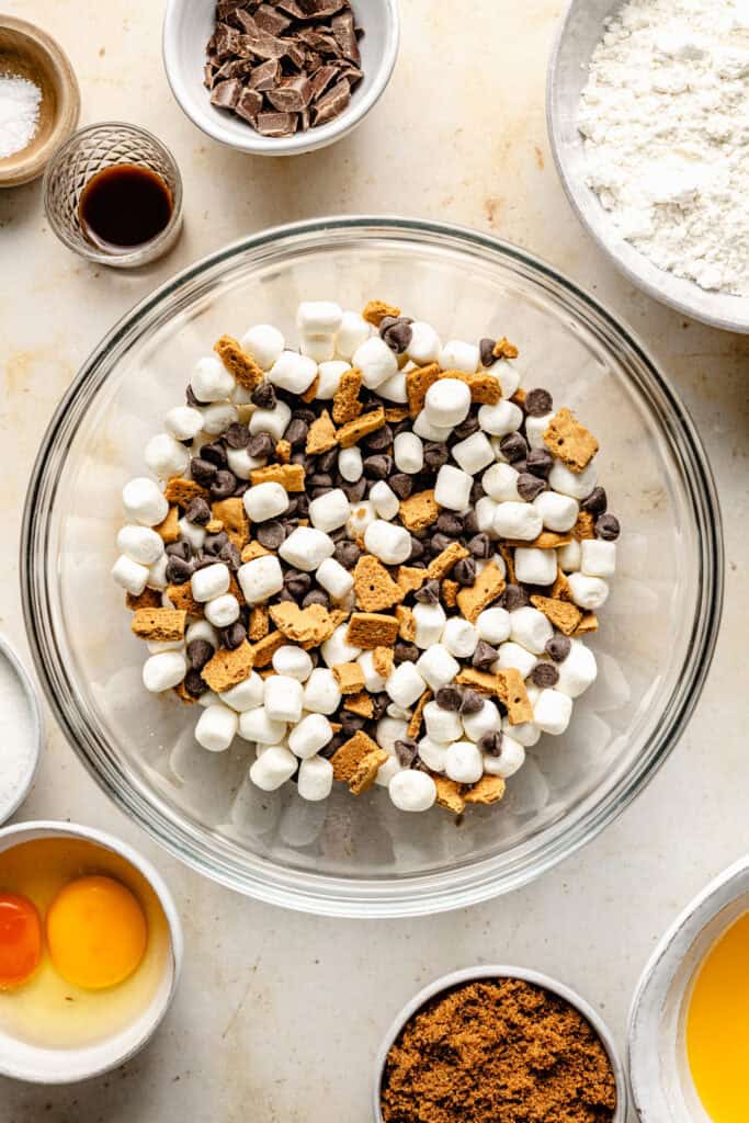 chocolate, graham cracker, and marshmallow in mixing bowl