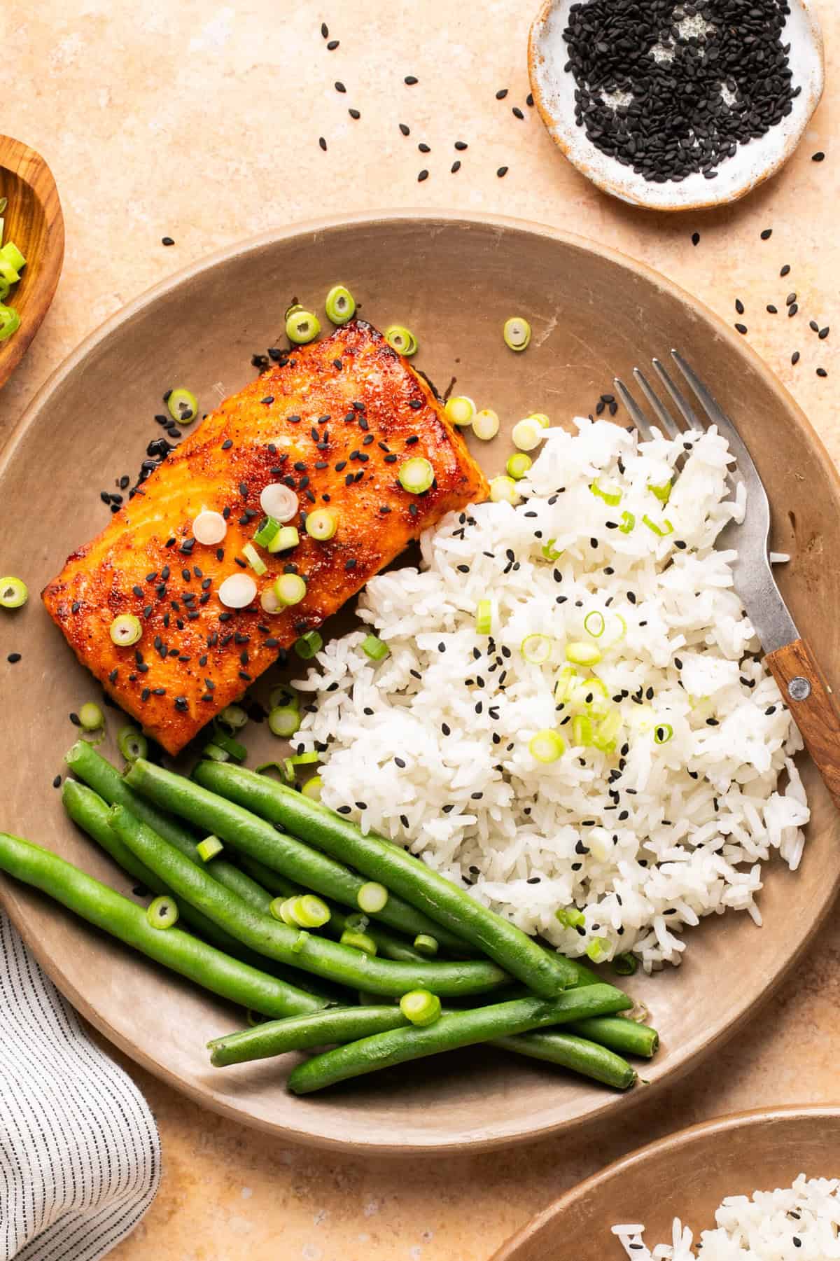 salmon rice and green beans in bowl