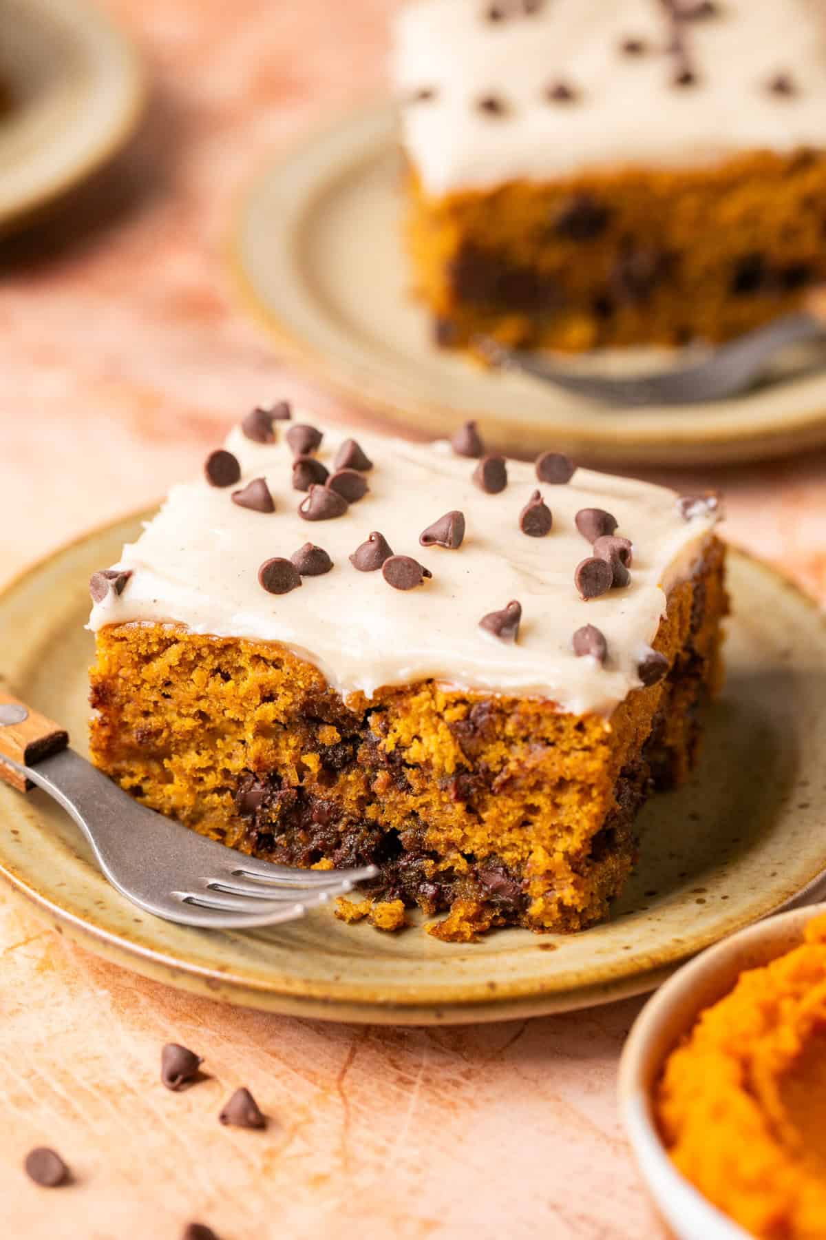 slice of cake on plate with fork