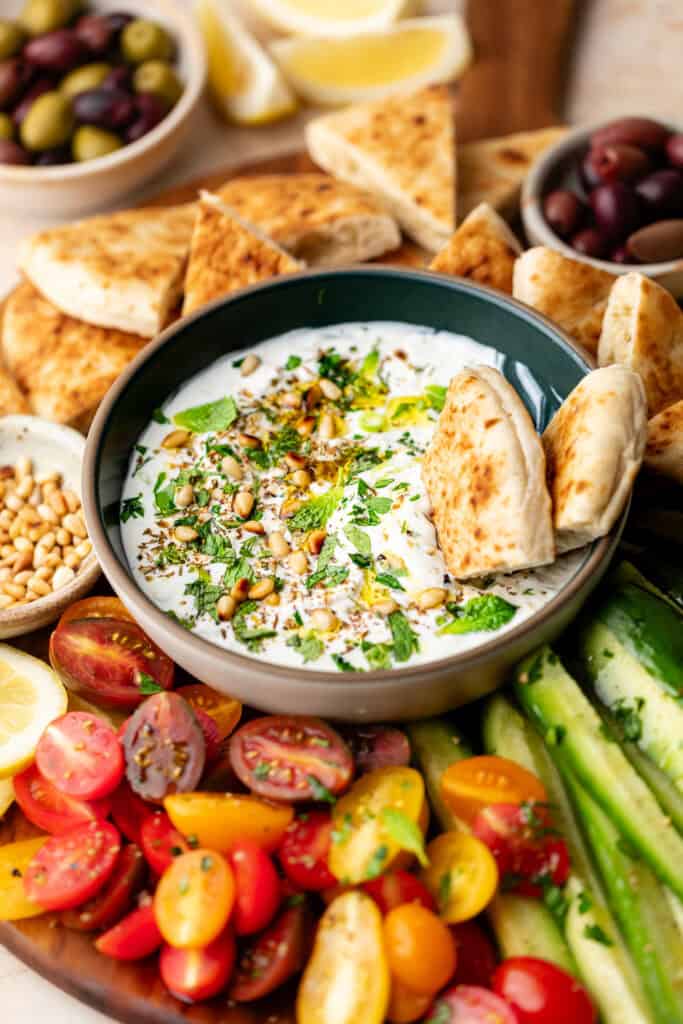 labneh dip with toppings and pita