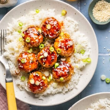 honey garlic meatballs over rice with fork
