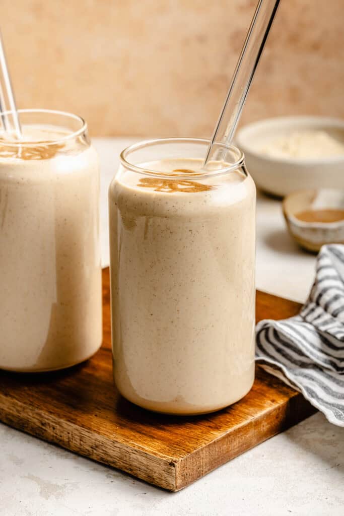 vanilla protein shakes in glasses with straws