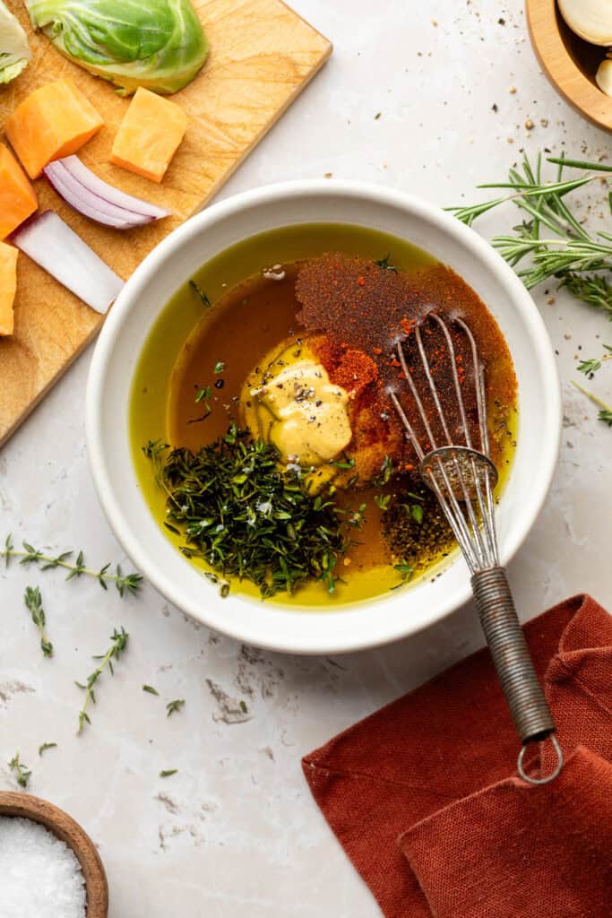 marinade ingredients in small bowl with whisk