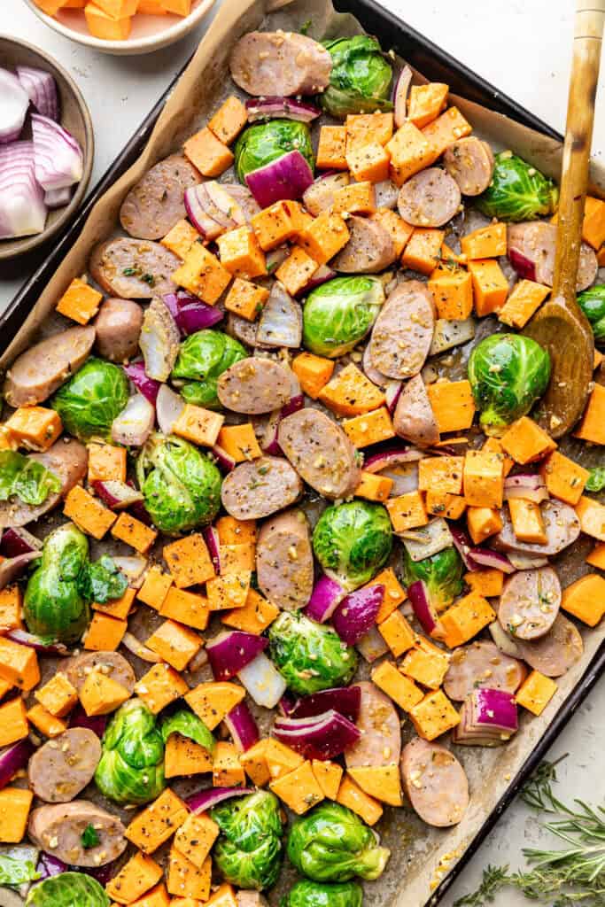 veggies and chicken sausage on sheet pan