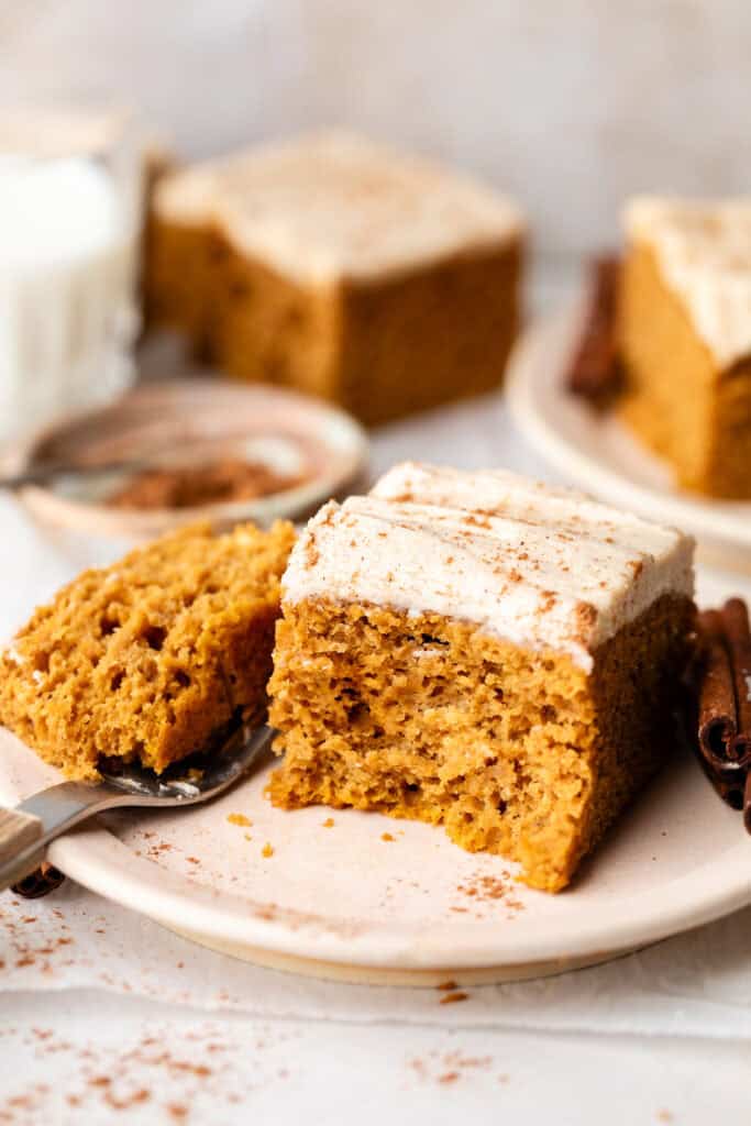 pumpkin cake on pale with fork