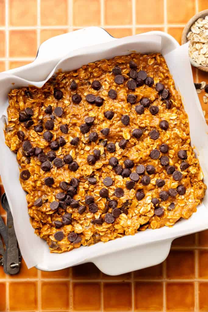 pumpkin oatmeal batter in baking dish