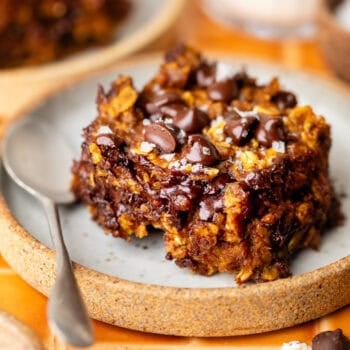 pumpkin oatmeal bar on plate with spoon