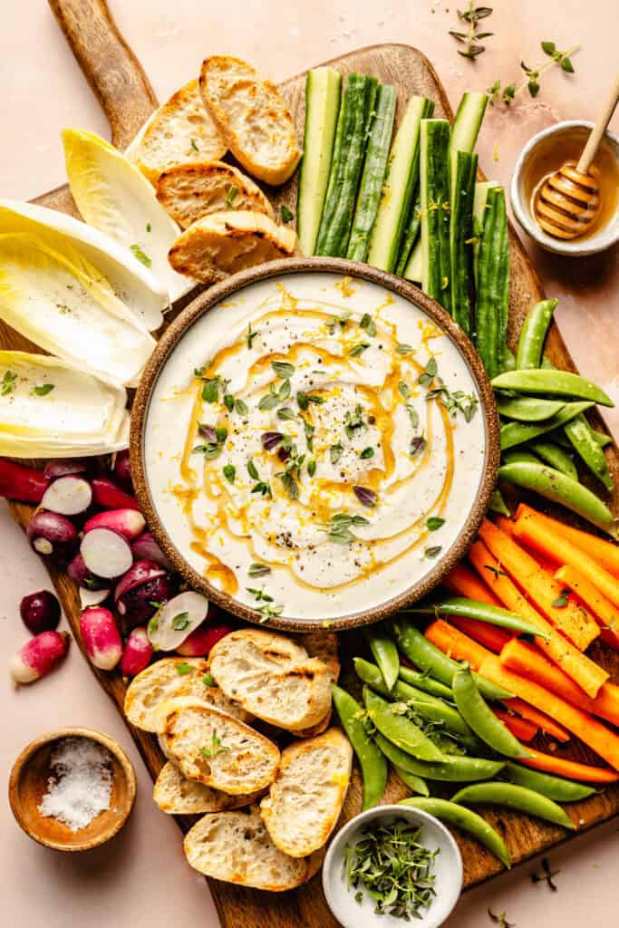 whipped ricotta in serving bowl with veggies