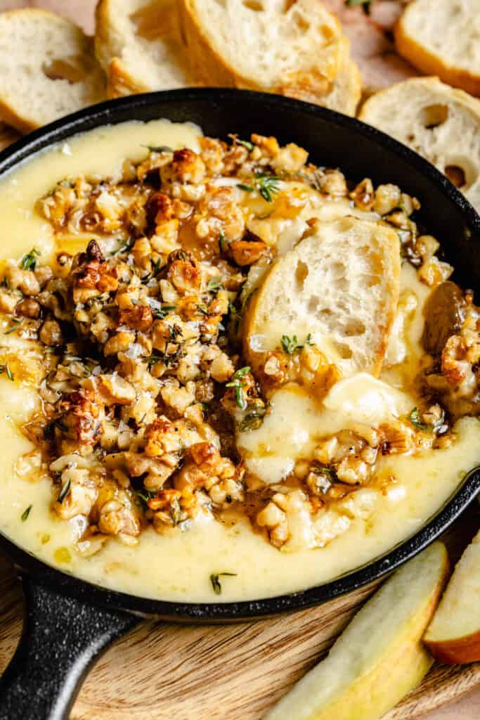 baked brie with nuts and crostini