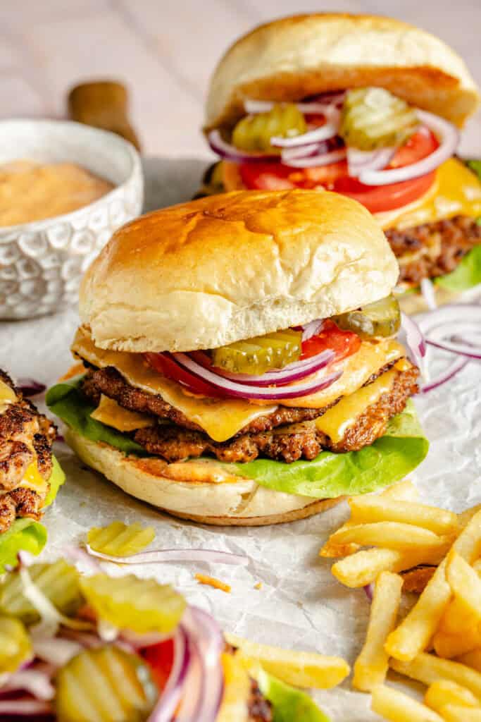 turkey smashburgers with fries on serving tray