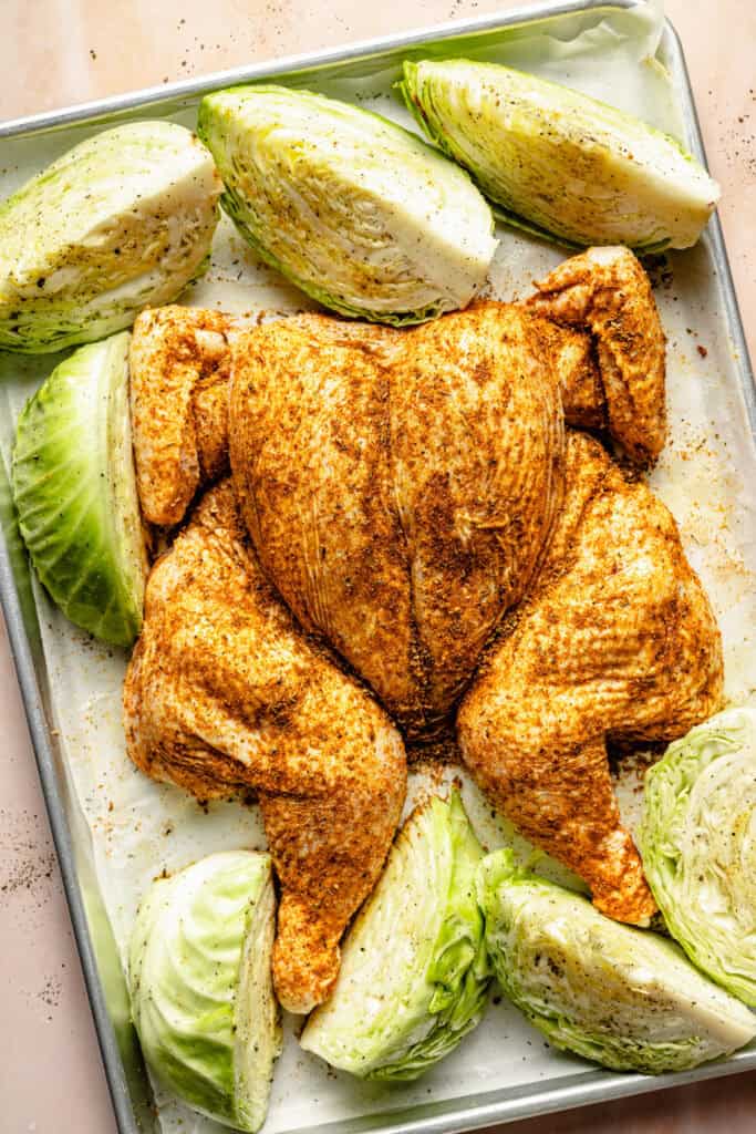 whole chicken on sheet pan before going in the oven