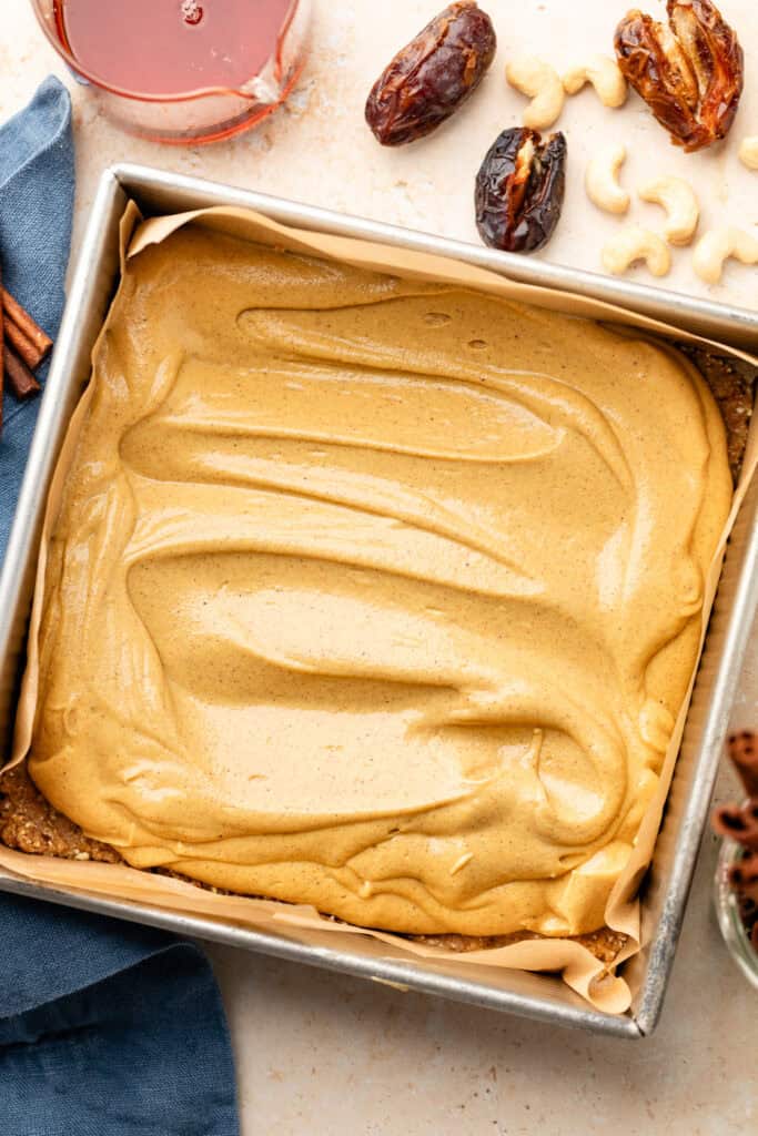 sweet potato cheesecake mixture spread over crust