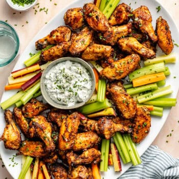 wings on platter with veggies and blue cheese dip