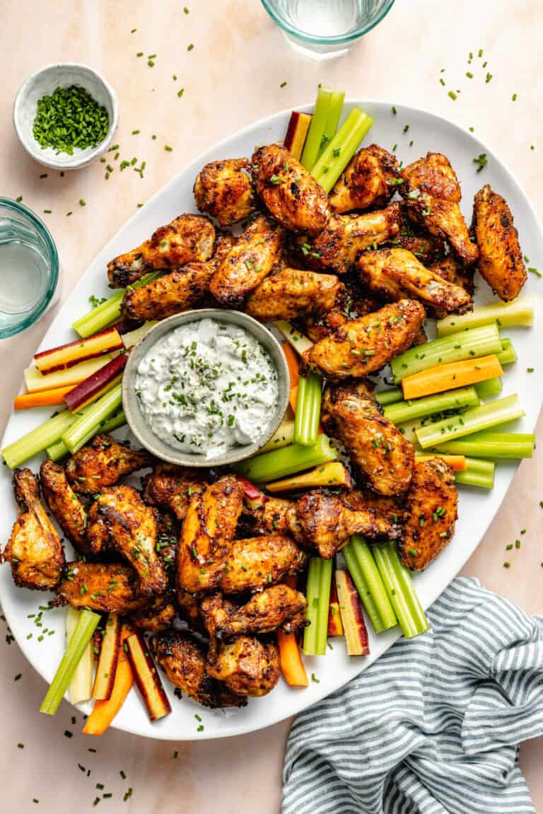 wings on platter with veggies and blue cheese dip