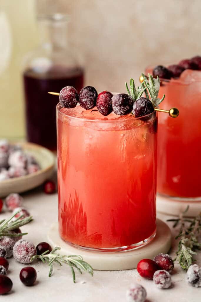 mocktail in glass with cranberries