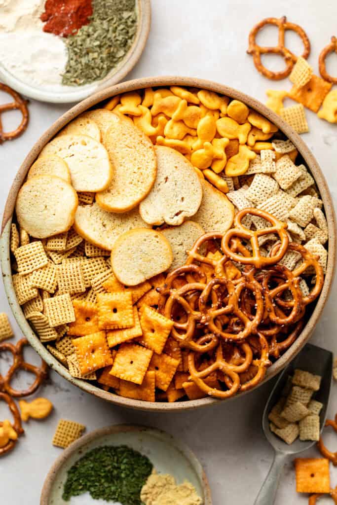 snack mix ingredients in large mixing bowl