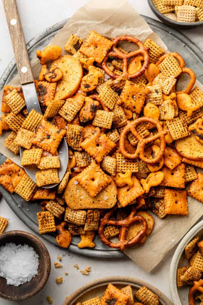 ranch snack mix on plate with serving spoon