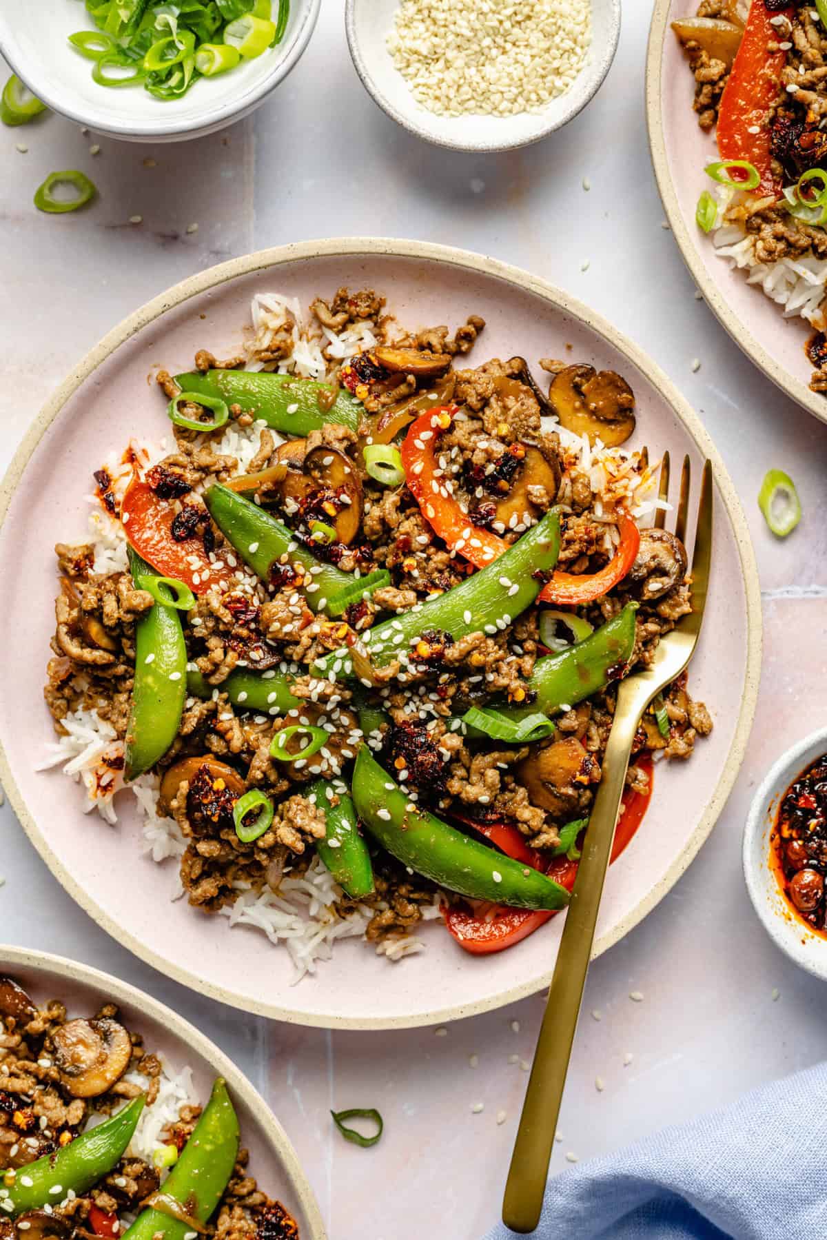 ground beef stir fry on plate with fork