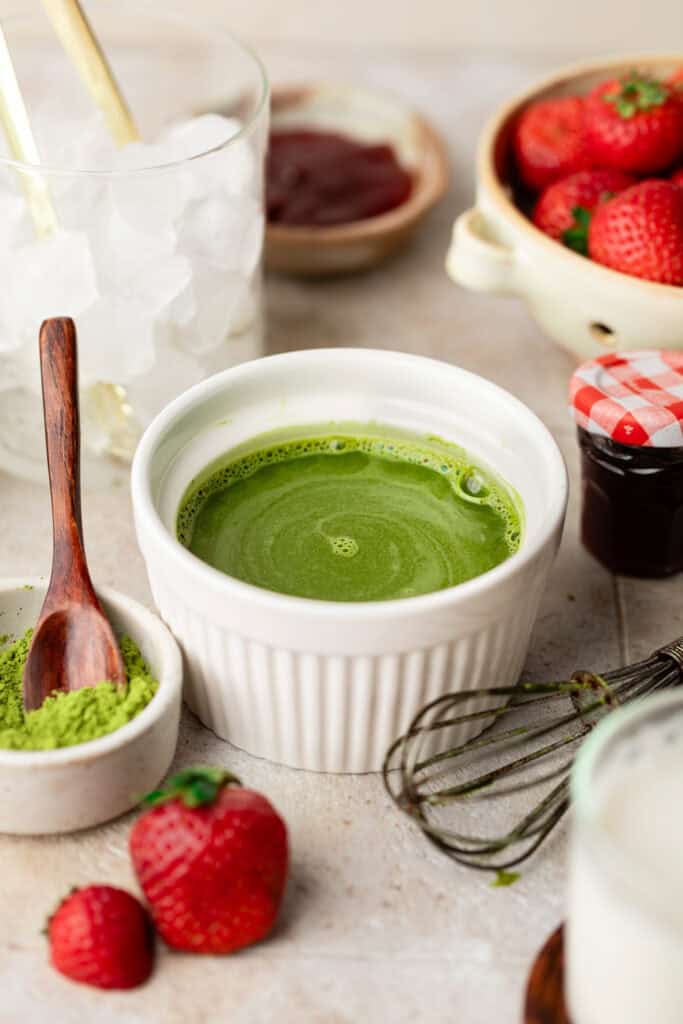 matcha whisked in small bowl