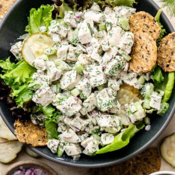 dill pickle chicken salad over greens with crackers