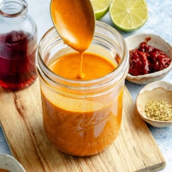 chipotle dressing in mason jar with spoon
