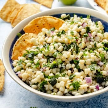 corn salsa in a bowl with tortilla chips
