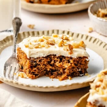 carrot cake bar on plate with fork