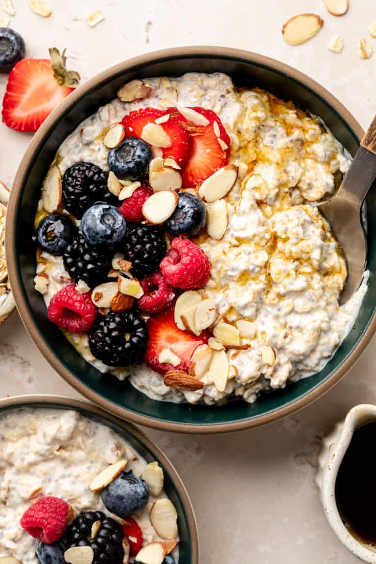 cottage cheese overnight oats in bowl with toppings