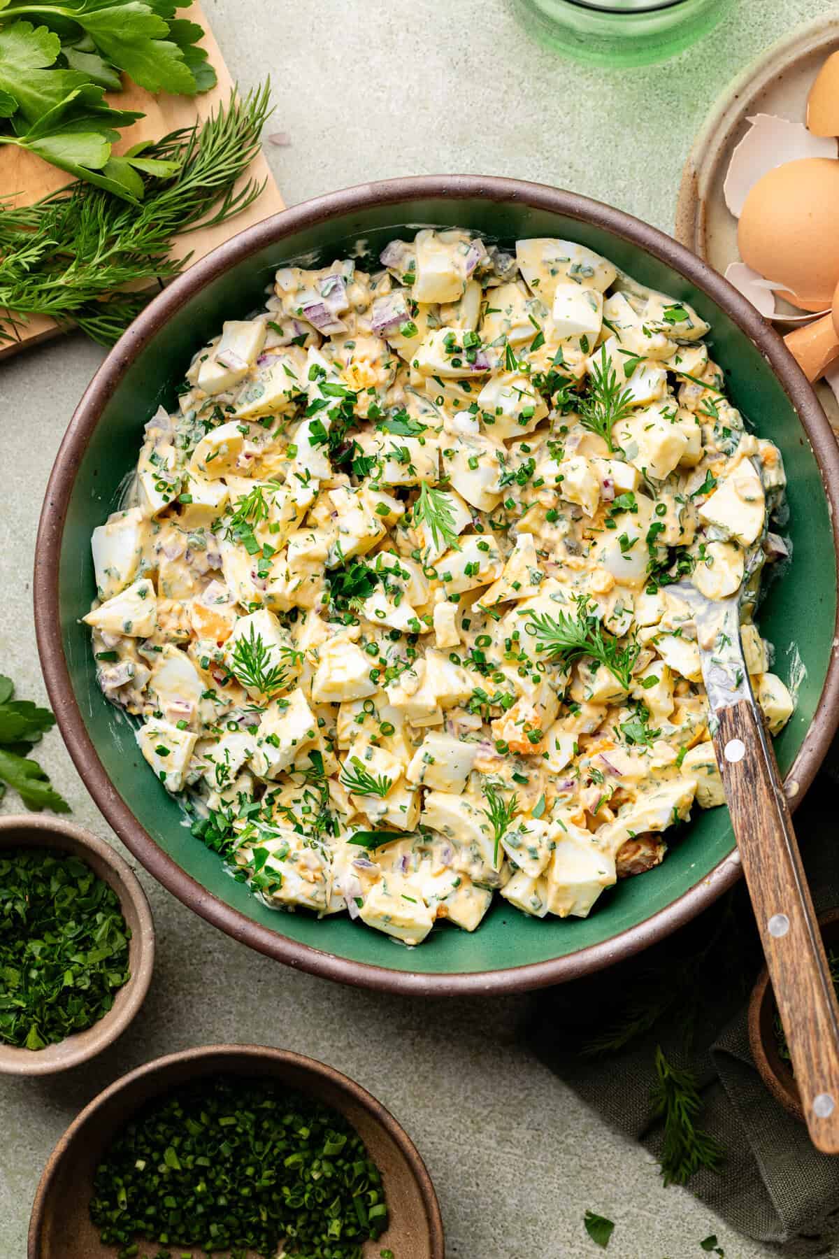 egg salad in bowl with mixing bowl