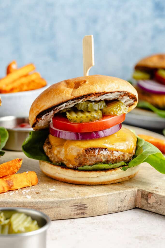 turkey burger with toppings and toothpick