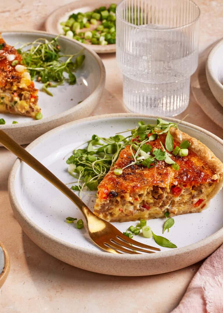 slice of quiche on plate