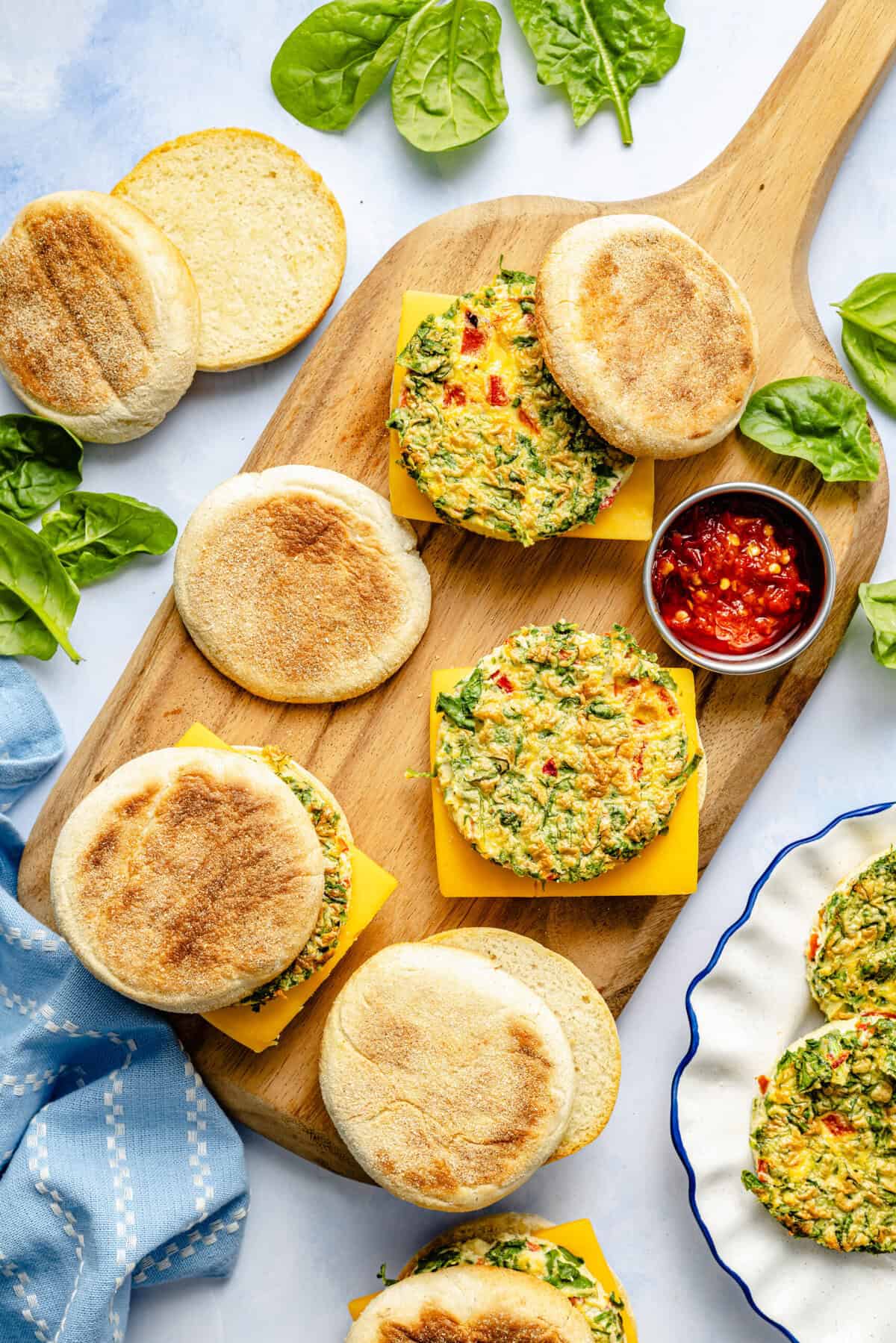 breakfast sandwiches on cutting board
