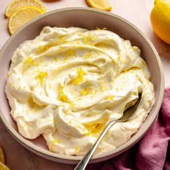 lemon cream cheese frosting in bowl with lemon zest