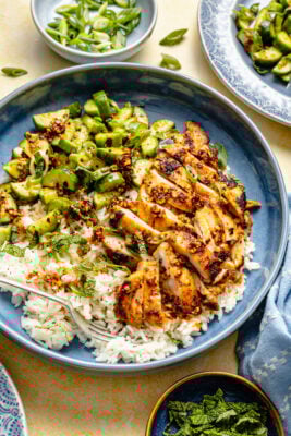 red curry chicken thighs with cucumber salad and rice