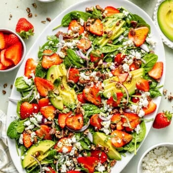 spinach strawberry salad on platter
