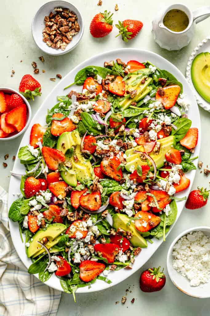 spinach strawberry salad on platter