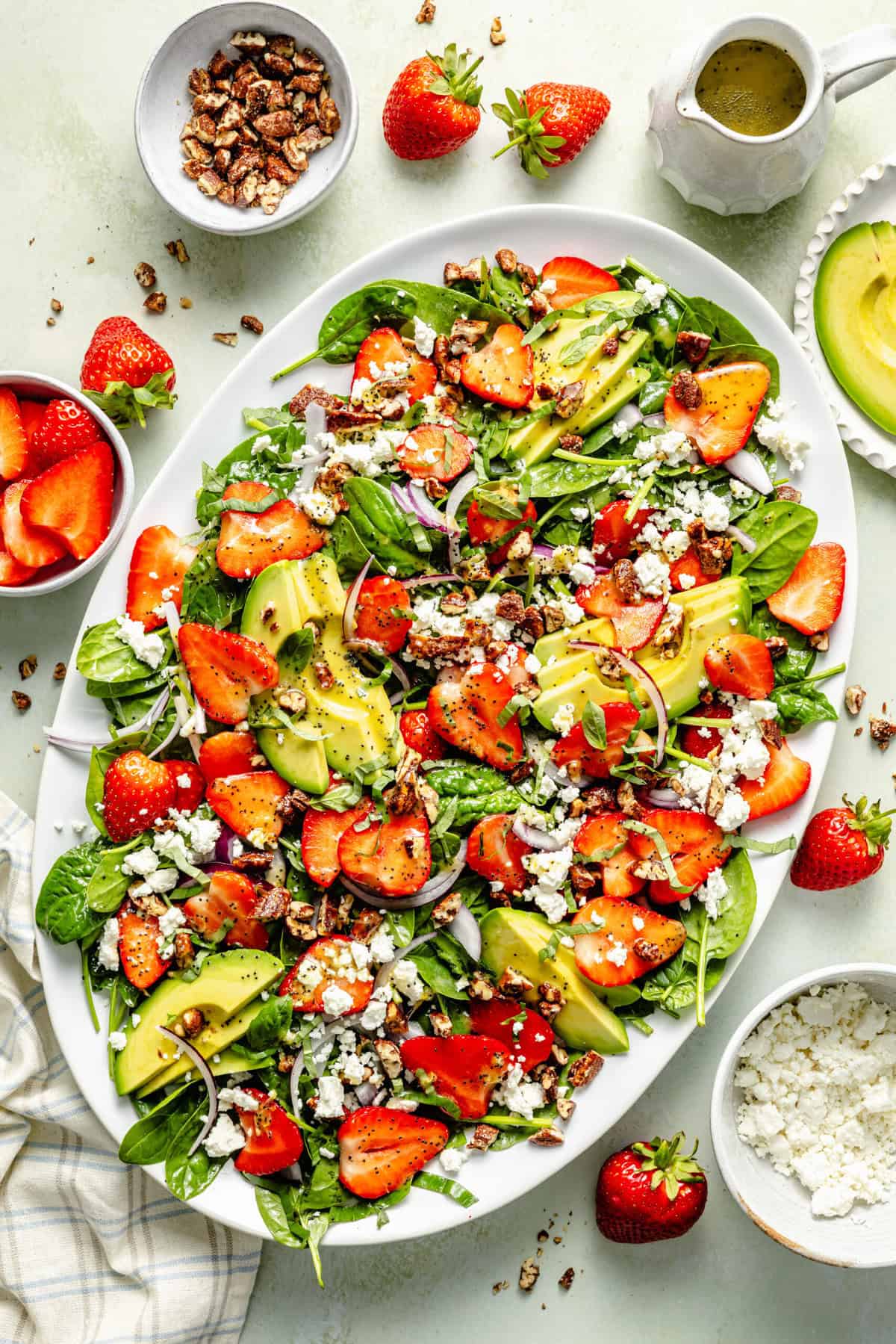 spinach strawberry salad on platter