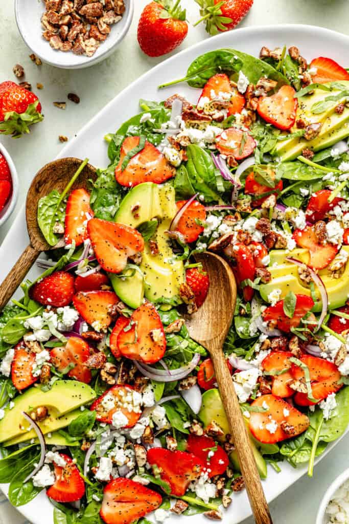 strawberry spinach salad on platter