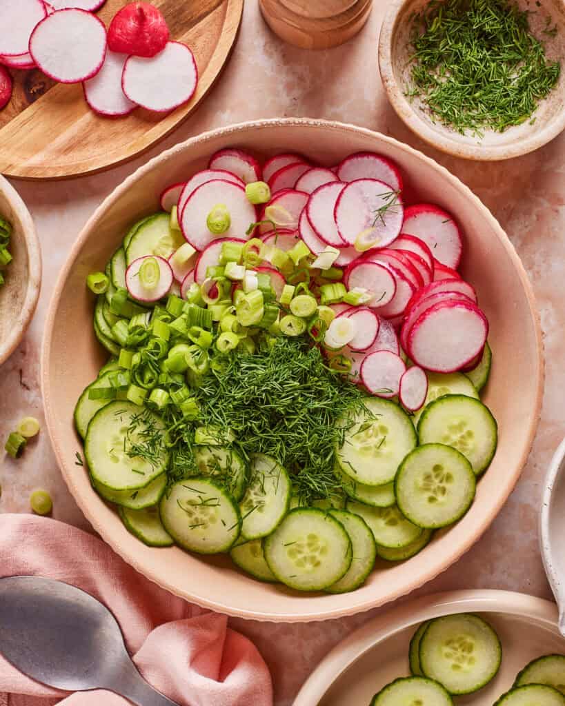 cucumber radish salad ingredients in bowl