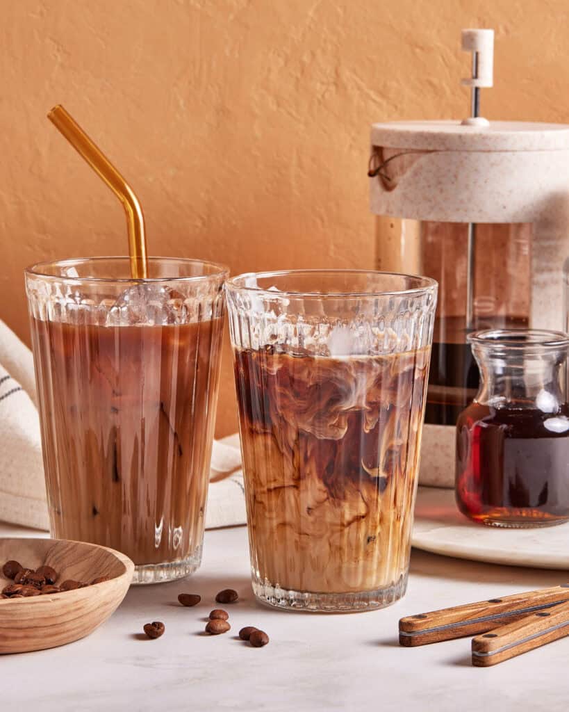 two iced coffees in glasses